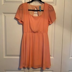 Coral open back dress from Francesca’s. Size small